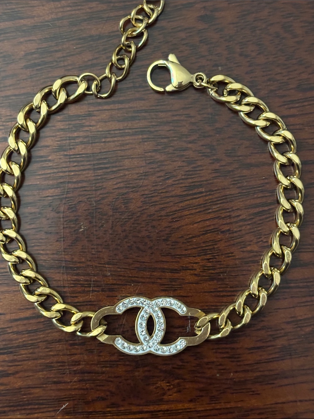 Brand New !  Gold Chain Bracelet with Crystal Logo Accent